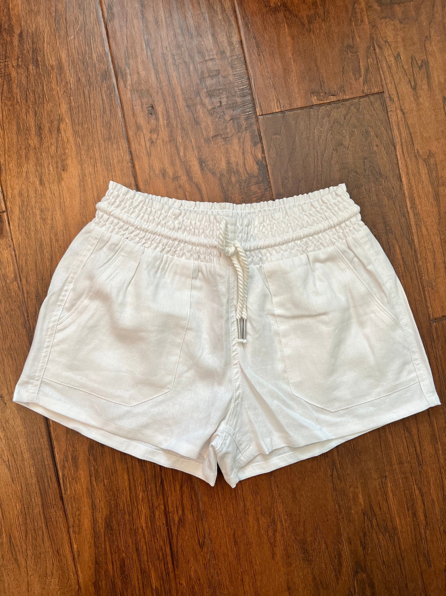 White linen shorts